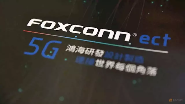 Taiwan weighs fining Foxconn over China chip investment - source