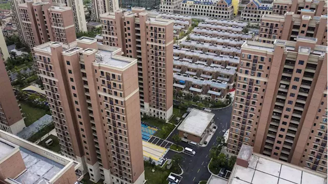 Business Maverick: China seeks to stem mortgage boycott with developer loans