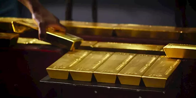 Business Maverick: Gold Steady Near 11-Month Low as Traders Weigh Rate Hike Outlook