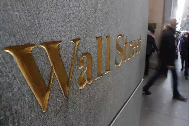 Wall Street closes down on slide in Apple shares, bank stocks