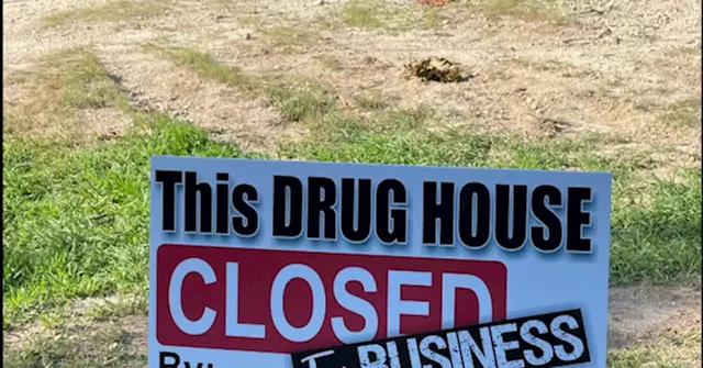 PHOTO: Sheriff Places 'Closed for Business' Sign Outside Drug House