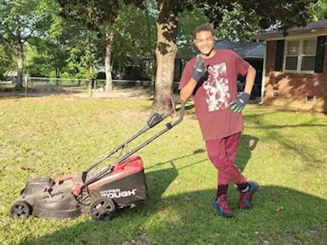 Boy, 14, starts lawn mowing business to help with his adoption