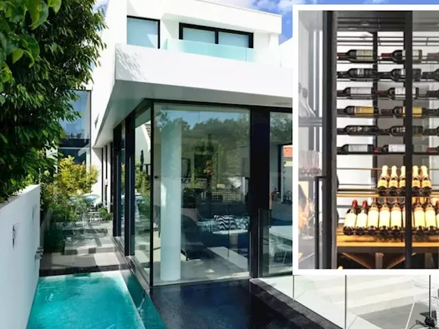 Brighton house boasting $25k glass wine cellar, pool and infra-red sauna blazes onto market - realestate.com.au