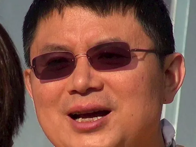 China jails Canadian tycoon for 13 years for finance crimes