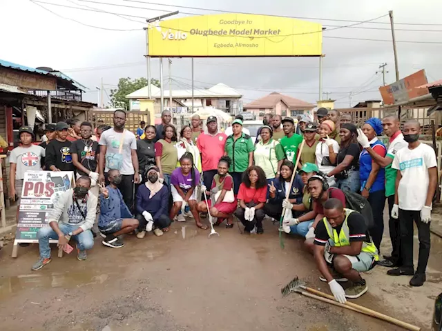 PHOTOS: Plogging Nigeria, youth-led group, clean up Lagos market | TheCable