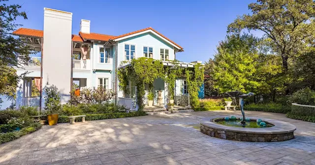 See a colorful, pattern-filled lakehouse on the market in Azle