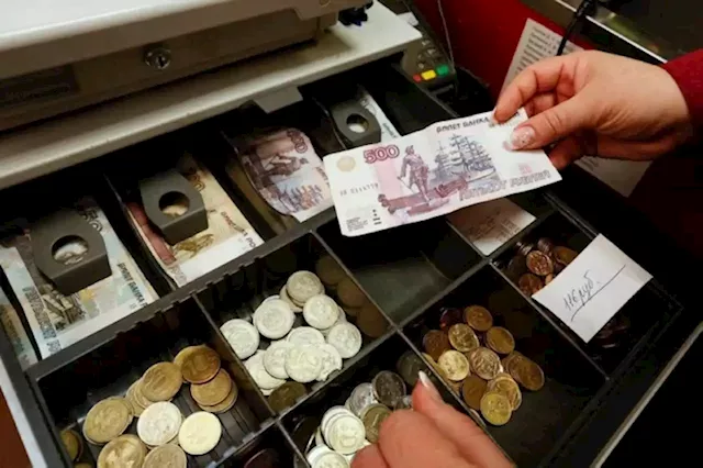 Russian rouble eases in early trade, stocks stay near recent highs