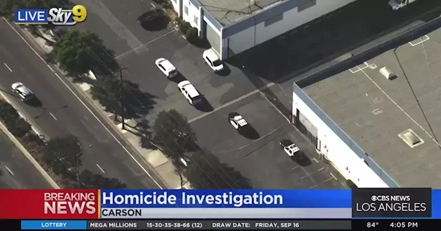 Authorities launch homicide investigation after man found dead inside business in Carson