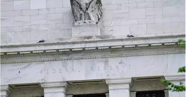 Fed officials stare down market volatility, say inflation remains paramount focus