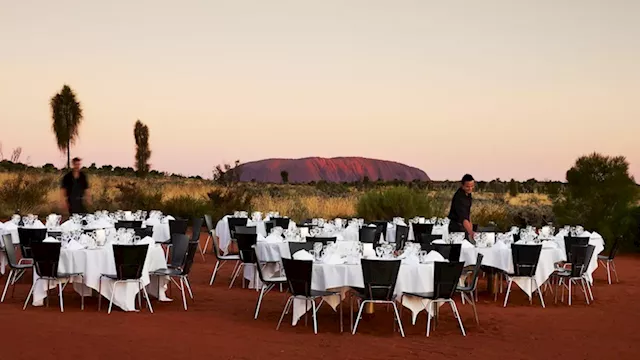 Business executives charged over alleged embezzlement of Voyages' Ayers Rock Resort