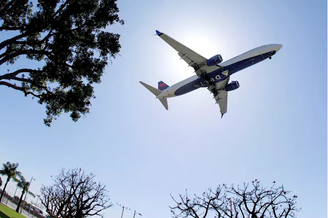 Delta says Hollywood, auto strikes are denting business travel