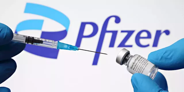 Pfizer stock sinks as pharma giant cuts earnings outlook on weaker COVID demand