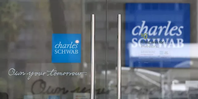 Charles Schwab’s stock rises as company says clients are moving cash into higher-yielding alternatives more slowly