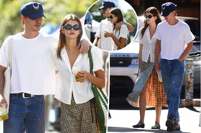 Austin Butler slings arm around girlfriend Kaia Gerber's shoulder on outing to farmer's market