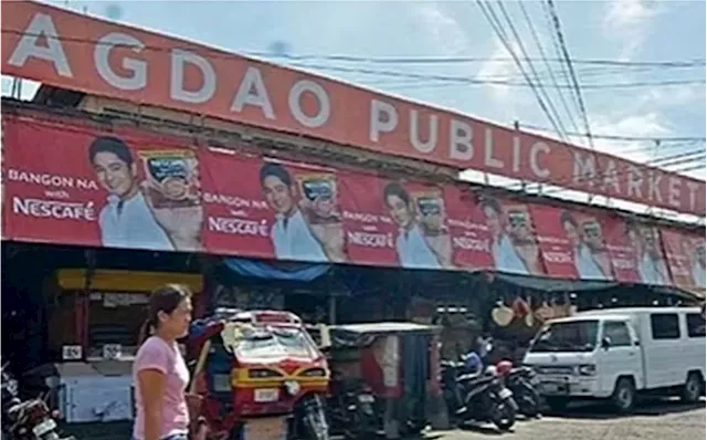 Lungkab sa sidewalk sa Agdao Public Market gi-aksiyonan sa pulis