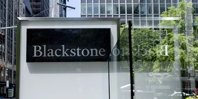 Blackstone's earnings miss draws a downgrade at CFRA