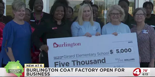 Burlington Coat Factory open for business, donating to the Girard Primary School