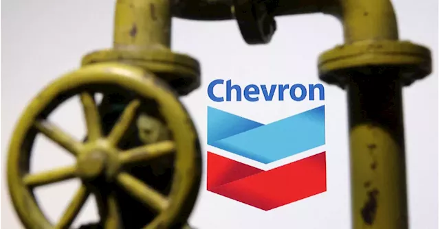 Analysis: Cash-rich Exxon, Chevron use stock for mega deals amid energy market jitters