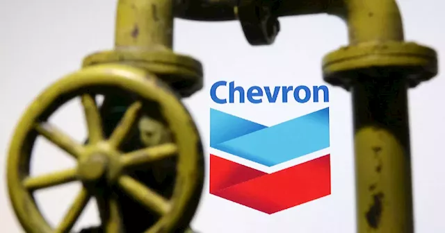 Analysis-Cash-rich Exxon, Chevron use stock for mega deals amid energy market jitters