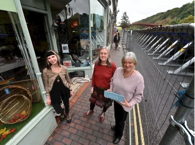 Business as usual in Ironbridge as traders continue to welcome visitors with river set to peak