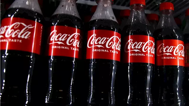 Coca-Cola earnings top estimates, raises guidance