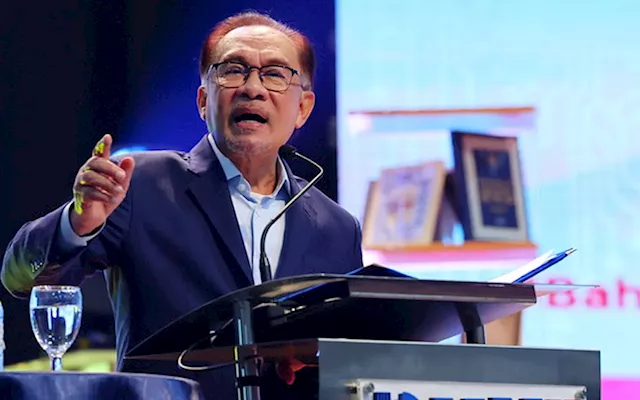 Anwar tells companies, universities to correspond with govt in Malay