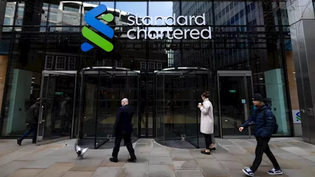 Standard Chartered shares slide 12% as China losses hit earnings