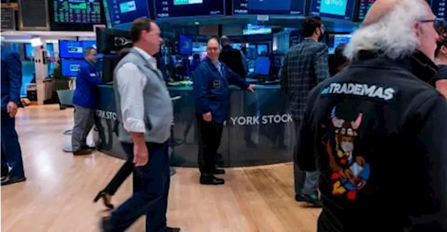 Wall Street ends sharply higher, powered by earnings momentum