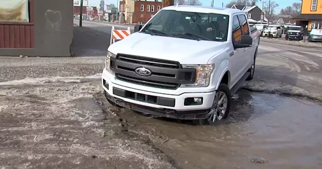 Massive Indianapolis pothole causing big headache for business owner