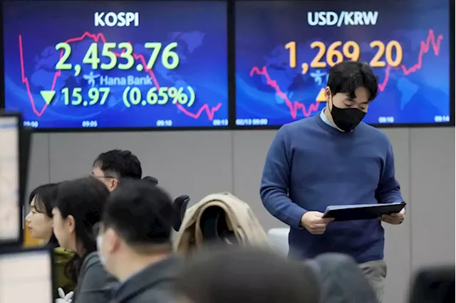 Asian stocks sink ahead of US inflation update | Joe Mcdonald / AP Business Writer