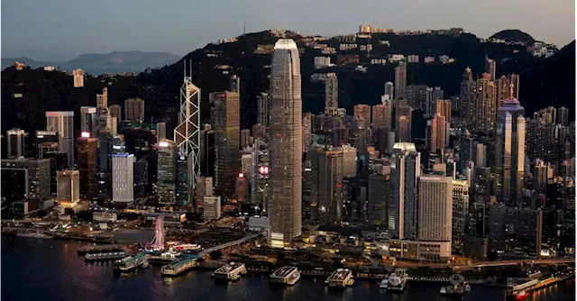 Hong Kong adds security law clauses to land sales, property stocks drop