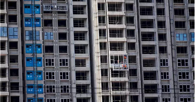 Analysis: China's mortgage rate cuts spur prepayment rush, threaten bank earnings