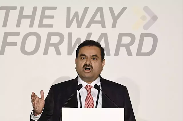 Business Maverick: Adani continues investor roadshow in Hong Kong to win back trust