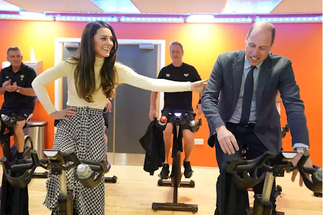 Prince William, Kate Middleton struggle in spin class — wearing business attire