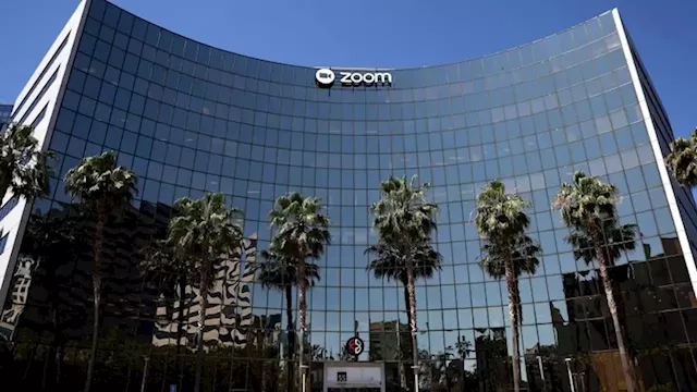 Zoom will lay off 1,300 employees and CEO is taking a massive pay cut | CNN Business