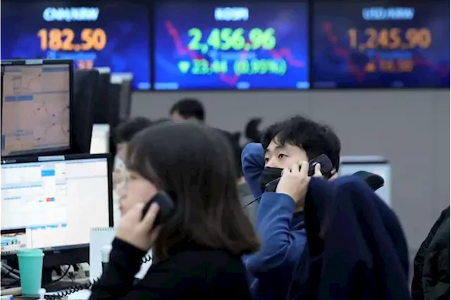 Asian stocks sink after US jobs data fan rate hike fears