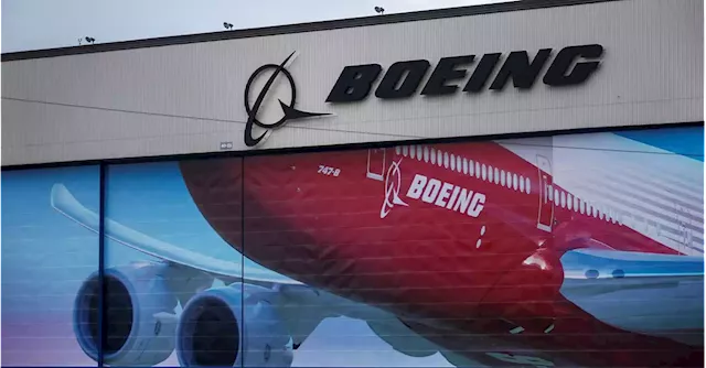 Boeing says it will cut about 2,000 white-collar jobs in finance and HR