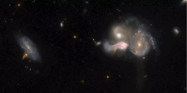 Hubble Sees an Epic Merger of Three Galaxies