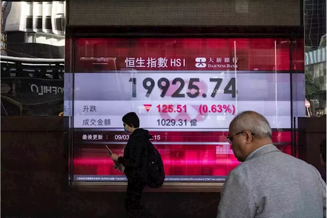 Stocks fall on worries about banks, pain of higher rates