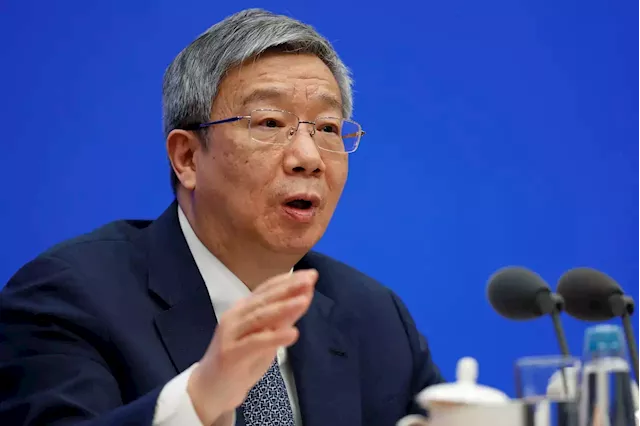 China chooses continuity, retaining central bank chief, finance minister