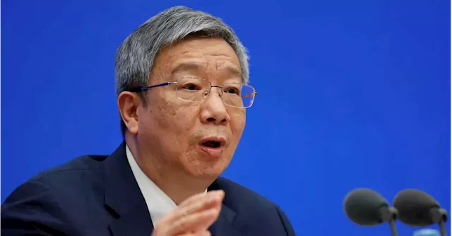 China chooses continuity, retaining central bank chief, finance minister