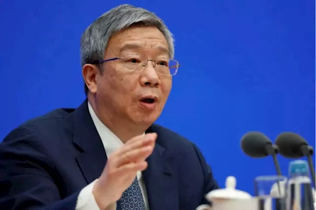 China chooses continuity, retaining central bank chief, finance minister