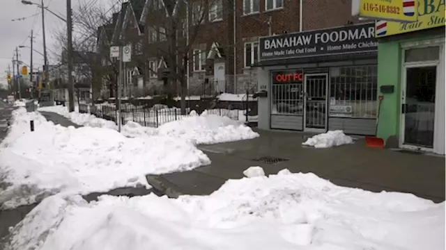 Toronto man says snow bank hurting his business