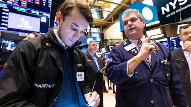 Dow pops more than 250 points as stocks try to shake off higher rates: Live updates