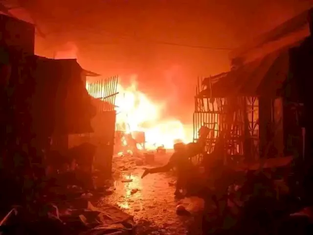 Buhari in Maiduguri, tours market destroyed by fire