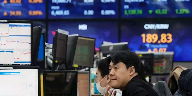 Asian stocks rise as investors await Fed decision