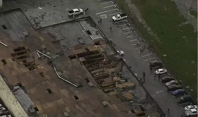 Small Tornado Tears Roof From Montebello Business, Sending Debris Flying Into Parking Lot and Streets