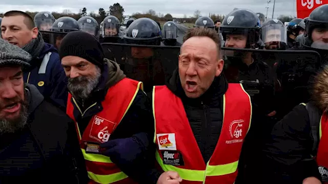 French unions hold first national strike since government rammed through pension reform | CNN Business