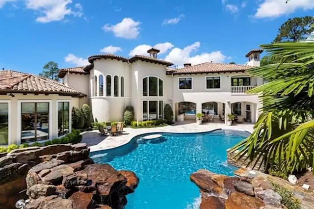 PHOTOS: Gated mansion with waterslide on market for $7M in The Woodlands; See its remodeled spaces, inside and out