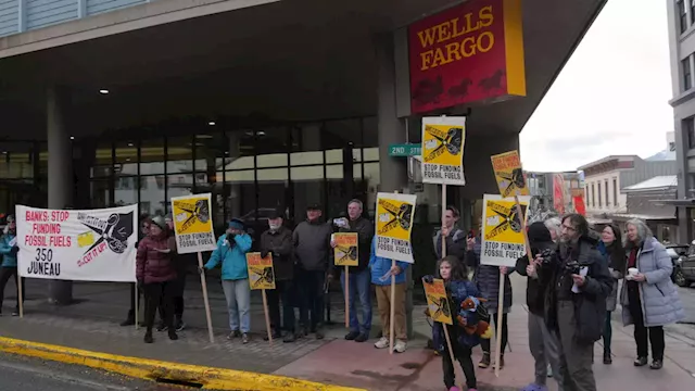 Juneau residents join national demonstrations against banks who finance fossil fuels